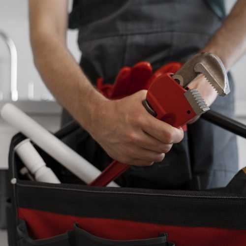 front-view-man-working-as-plumber front-view-man-working-as-plumber